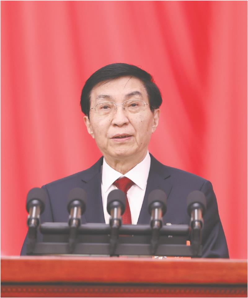 　　全国政协主席王沪宁代表政协第十四届全国委员会常务委员会，向大会报告工作。　     新华社发